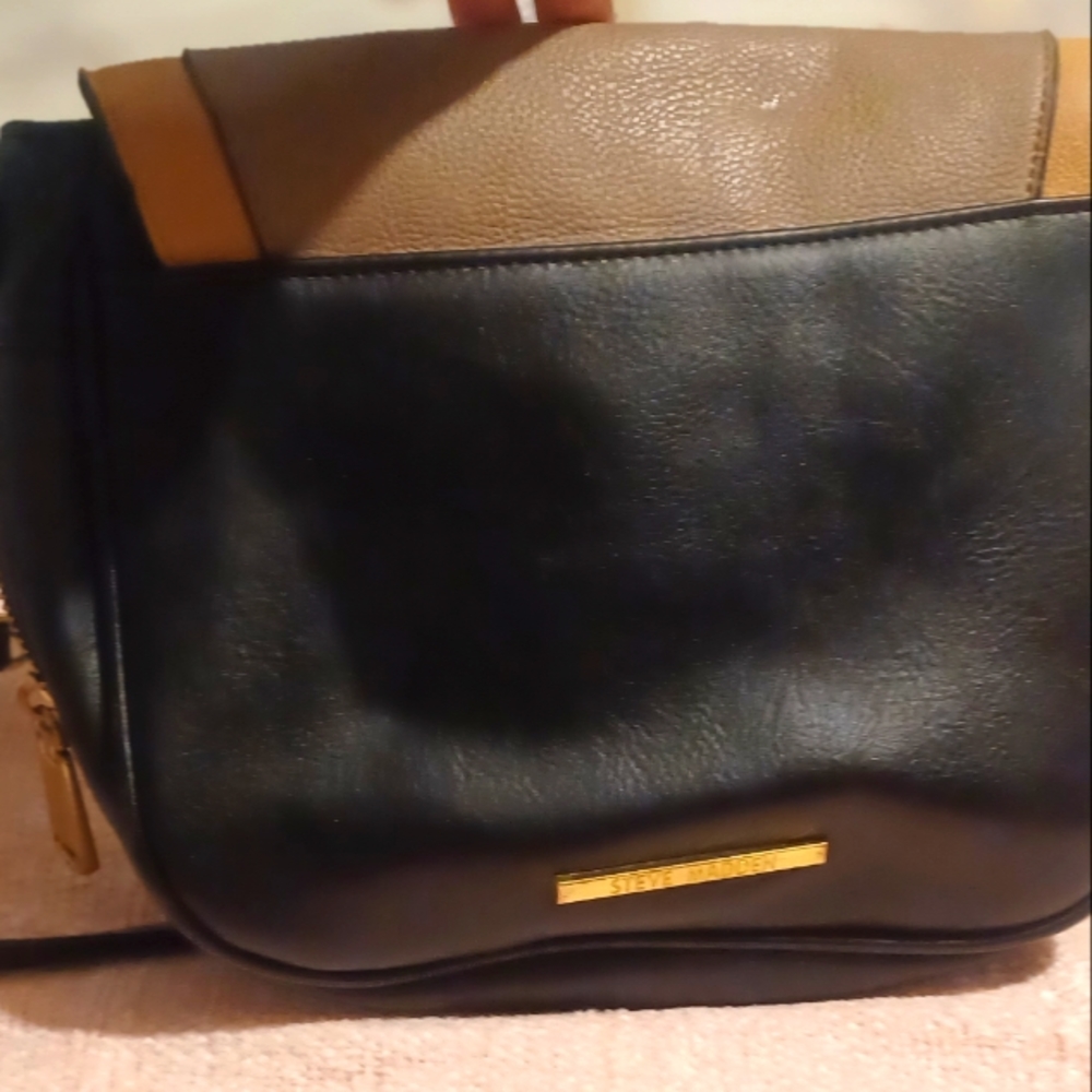 Steve Madison purse tan and black.